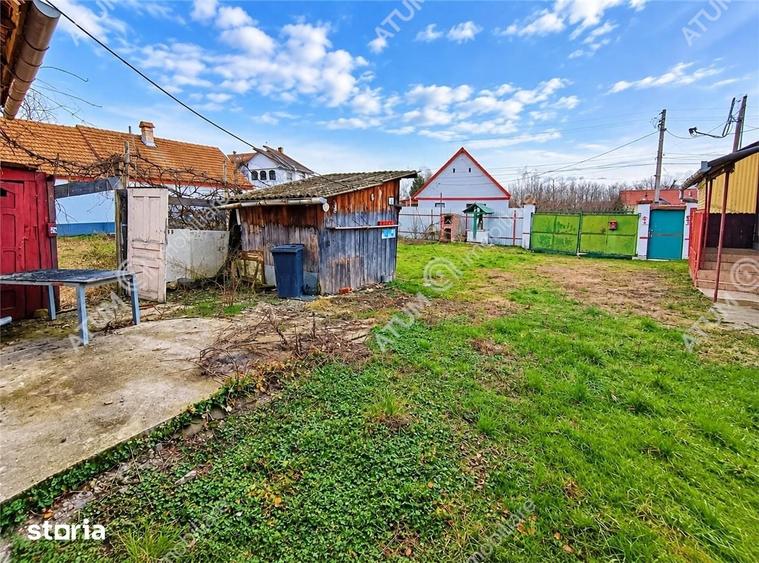 Casă cu 4 camere decomandat cu Teren 1650 Mp în Porumbacu de Jos