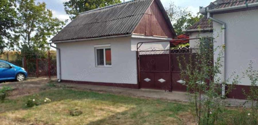 Casă cu 2 camere cu Teren 1939 Mp în Ghioroc
