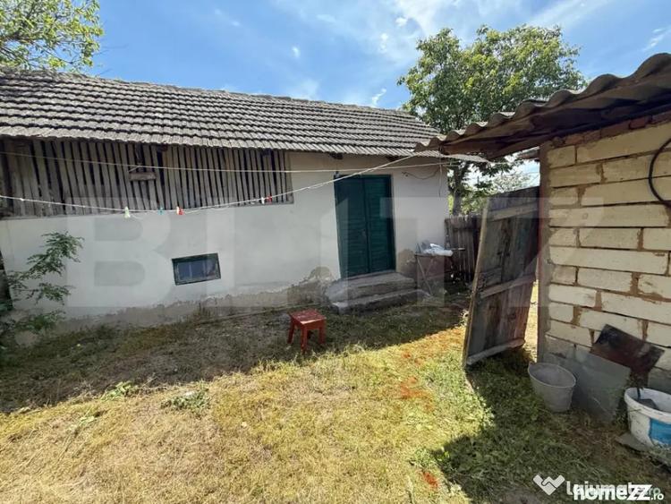 Casă cu 4 camere cu Teren 6000 Mp în Central