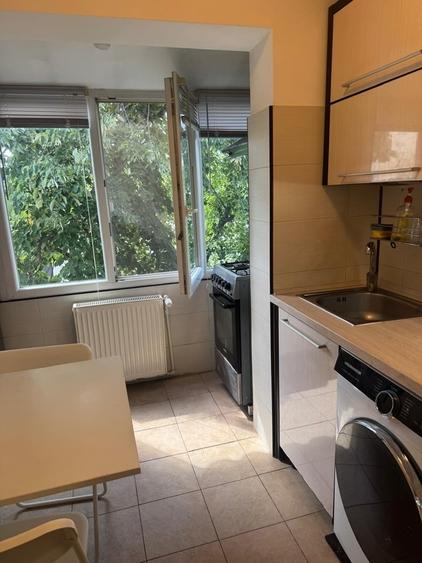 Apartament cu 3 camere semidecomandat în Ozana
