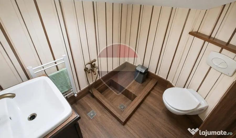 Casă cu 4 camere cu Teren 50 Mp în Romană