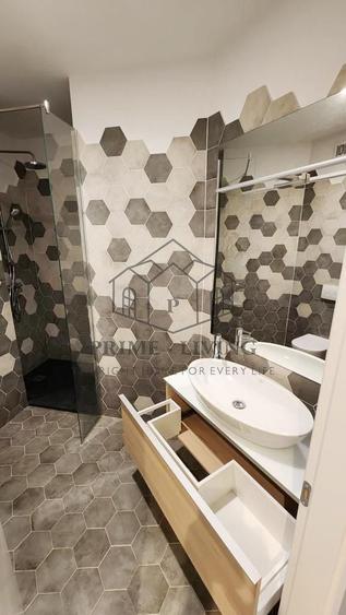 Apartament situat la etajul doi al unui bloc cu 3 etaje - 12