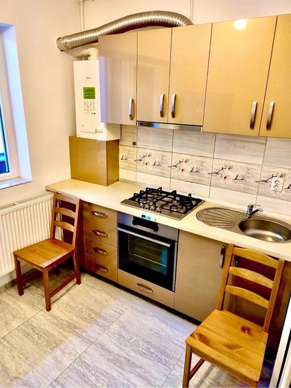 Apartament cu 2 camere semidecomandat, mobilat în Central