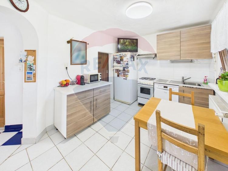 Casă individuală cu 5 camere cu Teren 1000 Mp în Sud