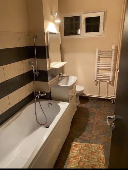 Apartament cu 2 camere semidecomandat în Podu Roș