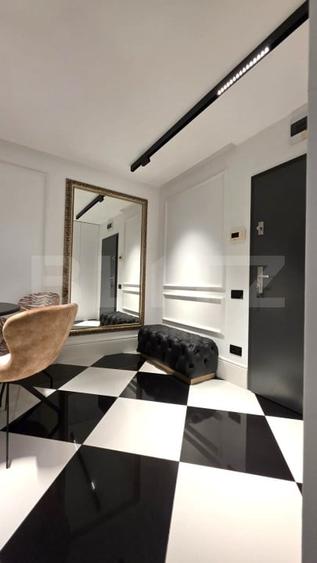 Apartament cu 2 camere semidecomandat, mobilat în Central
