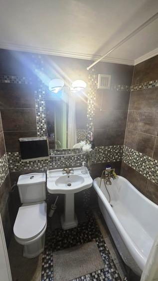 Apartament cu 3 camere decomandat în Ozana
