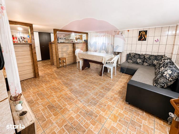 Casă cu Teren 1010 Mp în Periș