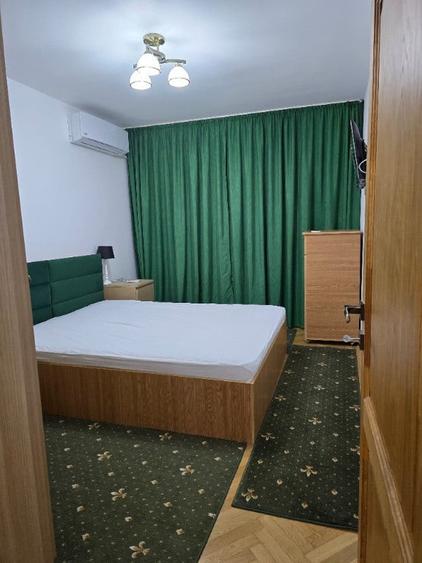 Apartament cu 3 camere semidecomandat în 1 Mai