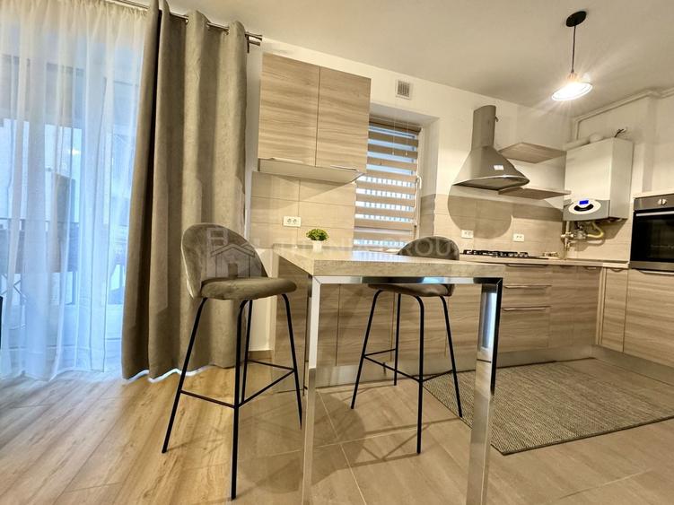 Apartament cu 2 camere semidecomandat, mobilat în Tractorul