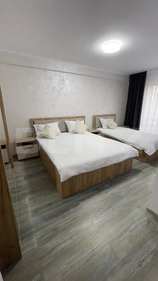 Apartament cu 3 camere semidecomandat, mobilat în Central