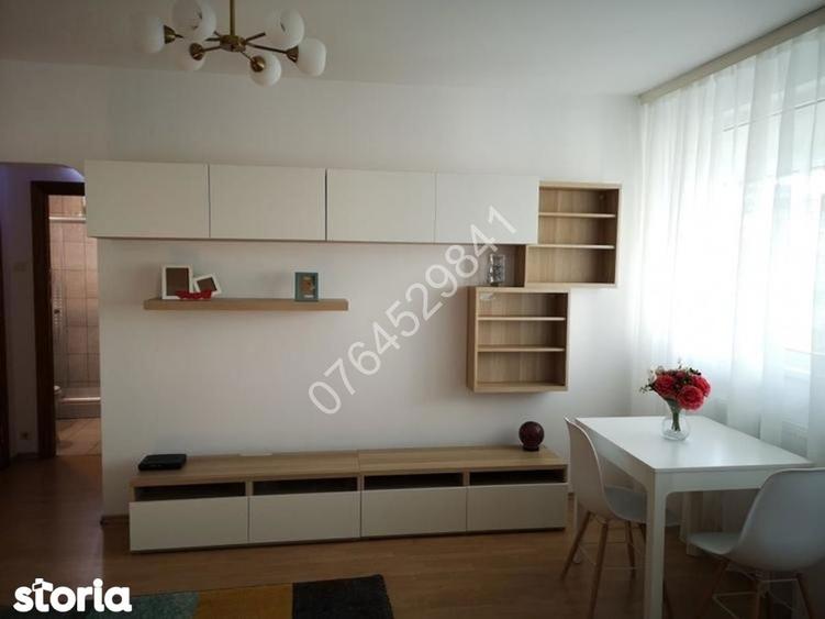 Apartament cu 2 camere semidecomandat, mobilat în 1 Mai
