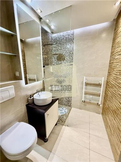 Apartament cu 2 camere semidecomandat, mobilat în Central