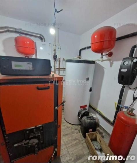 Casă cu 12 camere cu Teren 1000 Mp în Români