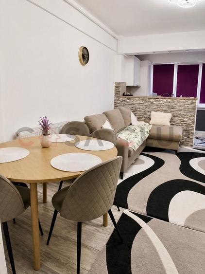 Apartament cu 2 camere semidecomandat, mobilat în Baciu