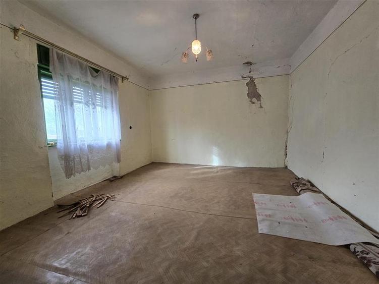 Casă individuală cu 3 camere cu Teren 7900 Mp în Boiu