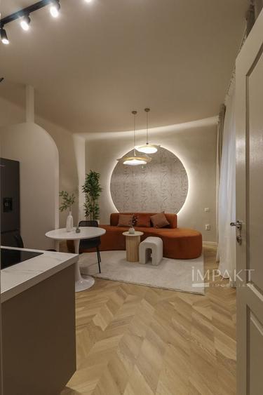 Apartament cu 2 camere semidecomandat, mobilat în Central