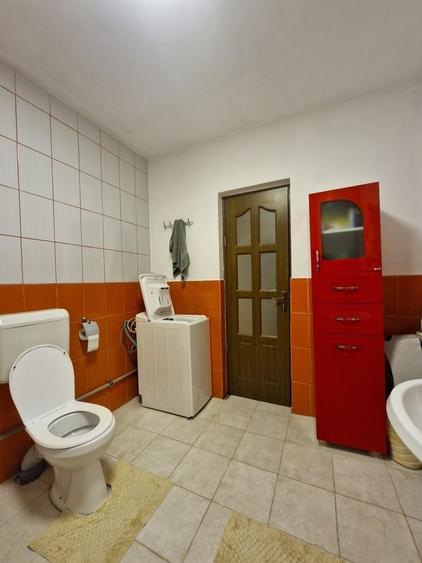 Casă cu 4 camere cu Teren 1000 Mp în Central