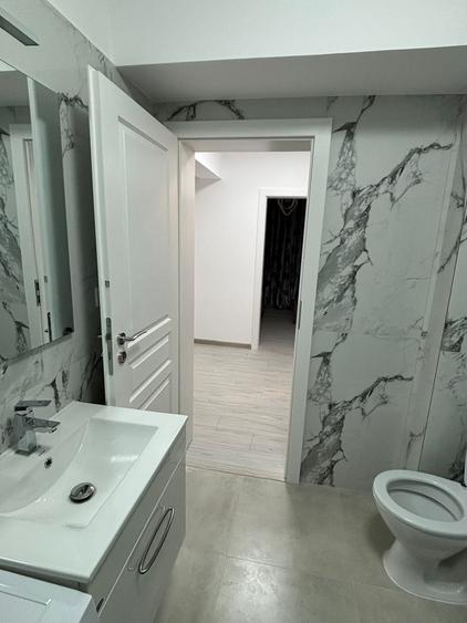 Apartament cu 2 camere semidecomandat în Cug