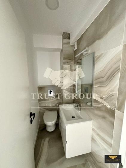 Apartament cu 3 camere decomandat în Polonă