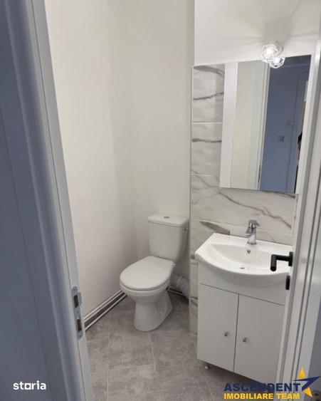 Apartament cu 3 camere decomandat în Tractorul