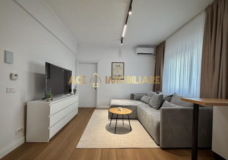 Apartament cu 2 camere semidecomandat, mobilat în 1 Mai