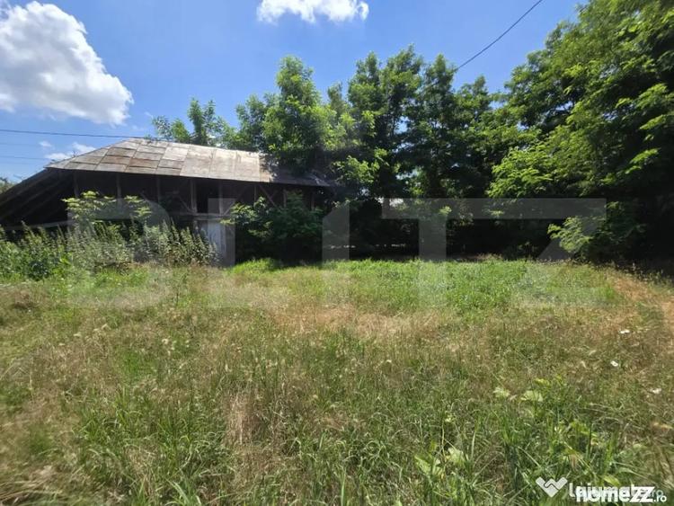 Casă cu 3 camere cu Teren 1954 Mp în Tomșani