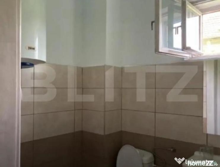 Casă cu 6 camere cu Teren 1000 Mp în Central
