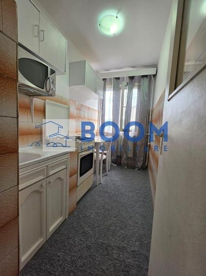 Apartament cu 2 camere semidecomandat, mobilat în Republicii