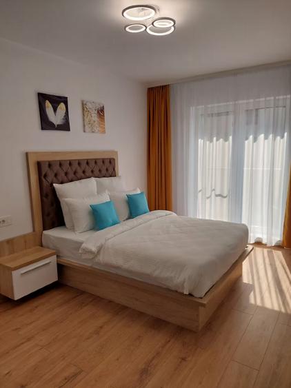 Apartament cu 2 camere semidecomandat, mobilat în Tractorul