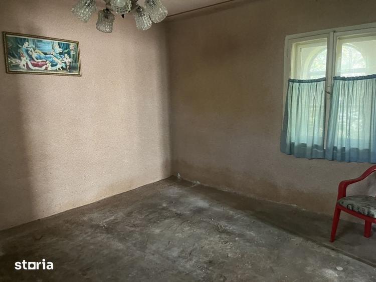 Casă cu 8 camere cu Teren 1150 Mp în Coșteiu