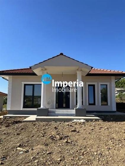 Casă individuală cu 4 camere cu Teren 500 Mp în Bucium