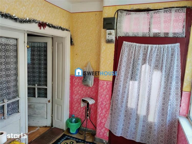 Casă cu 3 camere cu Teren 1250 Mp în Beclean