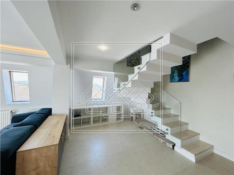 Ap pe 2 niveluri, 75 mp utili + 2 balcoane, mobilat modern - 12