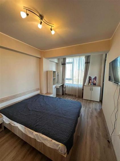 Apartament cu 3 camere semidecomandat, mobilat în Exterior Sud