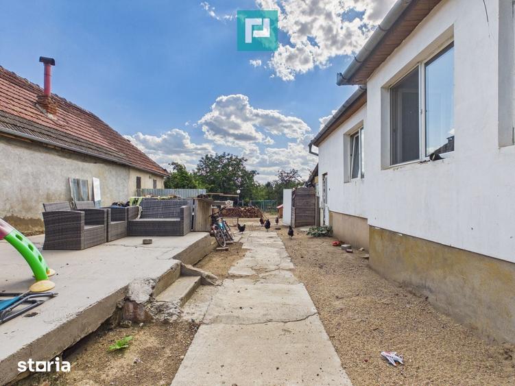 Casă cu 2 camere cu Teren 1000 Mp în Păuliș