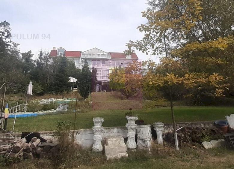 Casă individuală cu 15 camere decomandat cu Canalizare în Băneasa