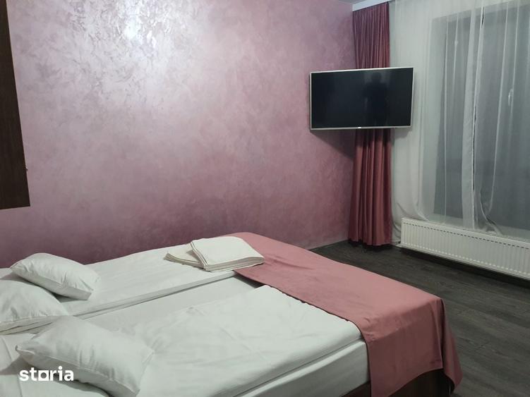 Casă cu 7 camere cu Teren 1500 Mp în Sânmartin