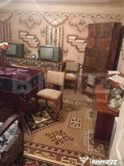 Casă cu 2 camere cu Teren 2000 Mp în Central