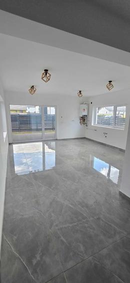 Casă cu 3 camere în Tărlungeni