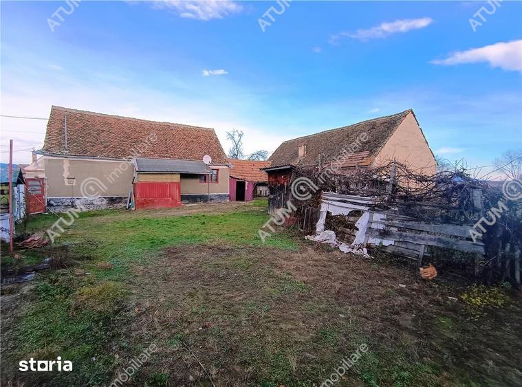 Casă cu 4 camere decomandat cu Teren 1650 Mp în Porumbacu de Jos