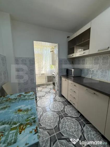 Apartament de vanzare, 2 camere decomandate, etaj 1, loc de - 18
