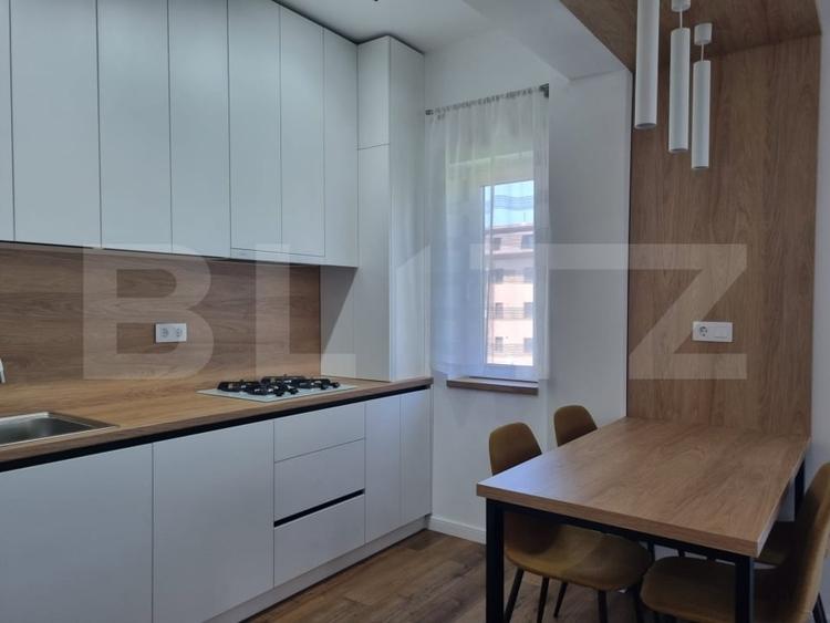 Apartament cu 2 camere semidecomandat, mobilat în Baciu