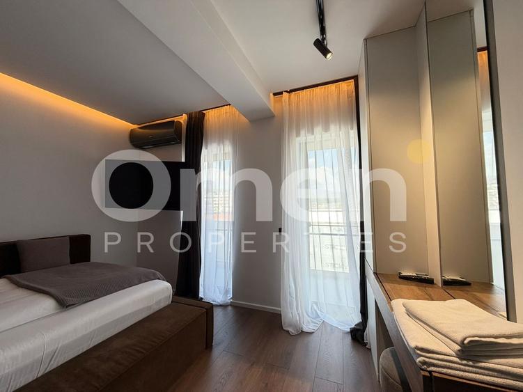 Apartament cu 3 camere semidecomandat, mobilat în Central