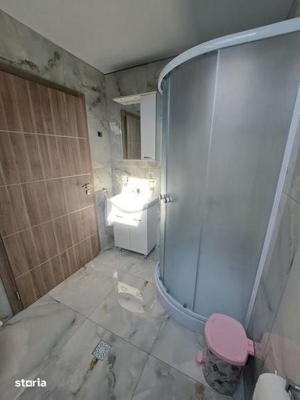 Casă cu 4 camere cu Teren 215 Mp în Coșteiu