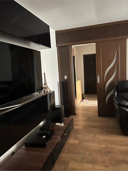 Vand apartament 2 camere si balcon de 15 metri patrati la parter in oras Moreni - 4