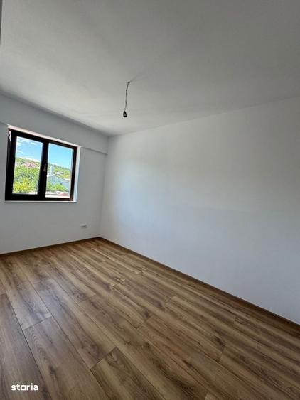 Apartament cu 2 camere decomandat în Bucium — fotografia 3