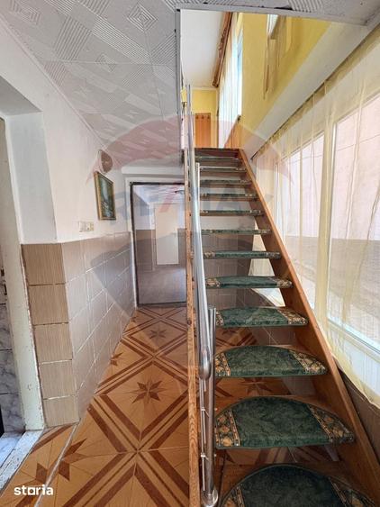 Casă cu 4 camere cu Teren 292 Mp în Central