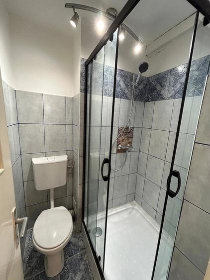 Apartament cu 3 camere decomandat în Tractorul