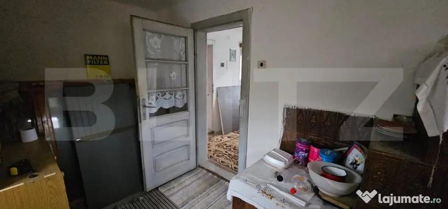 Casă cu 2 camere cu Teren 1200 Mp în Central